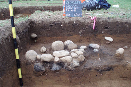 stones from a hearth in archaeological dig site