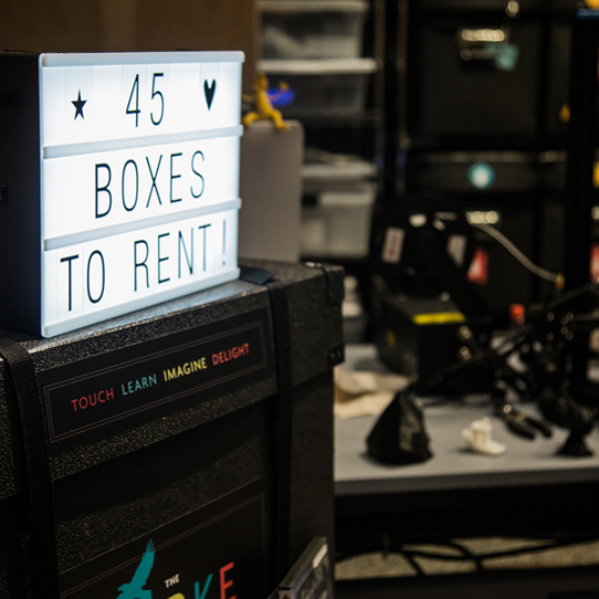 Burke Boxes lit sign says 45 boxes to rent