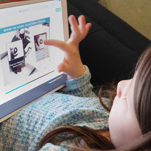 Virtual Field Trips a child interacts with a virtual field trip on an ipad